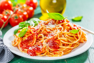 Tasty italian pizza with tomato sauce and parmesan