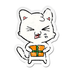 distressed sticker of a cartoon hissing cat