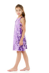 Little girl in an elegant dress.