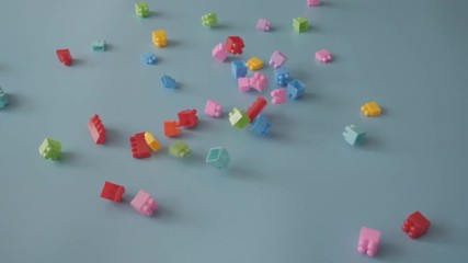 Toy block pieces on celestial background