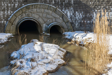 Channels for runoff waters.
