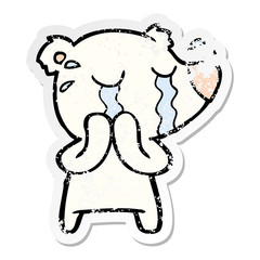 distressed sticker of a cartoon crying polar bear