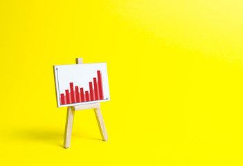 Rack with information chart on a yellow background. Business planning and revenue analysis....