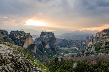 Fototapeta na wymiar Sunset in Meteora, a rock formation in central Greece, hosting one of the largest and most precipitously built complexes of Eastern Orthodox monasteries, second in importance only to Mount Athos.