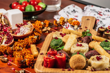 Pkhali, traditional Georgian dish of chopped and minced vegetables, made of cabbage, eggplant, spinach, beans, beets and combined with ground walnuts, vinegar, onions, garlic, pomegranate and herbs
