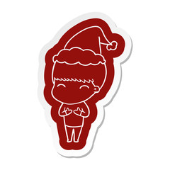 happy cartoon  sticker of a boy wearing santa hat