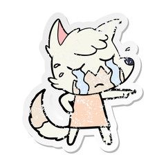 distressed sticker of a crying fox cartoon