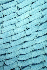 blue color knitted wool as background