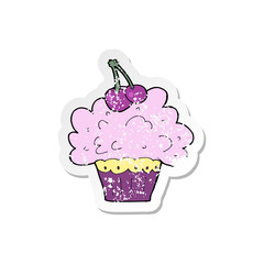retro distressed sticker of a cartoon big cupcake