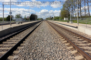 railway track with a background of clouds, railway station - Image