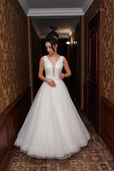 Young beautiful bride in antique interior