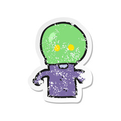 retro distressed sticker of a cartoon little alien