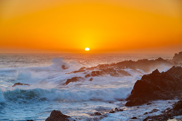 Waves at beautiful sunset