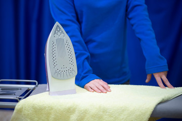 woman ironing clothes