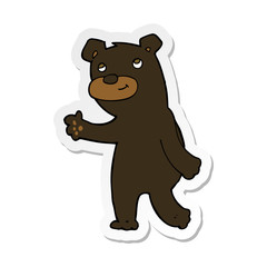 sticker of a cute cartoon black bear