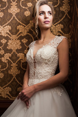 Morning of the bride when she wears a beautiful dress, woman getting ready before wedding ceremony 