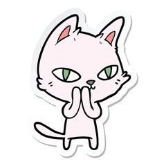 Obraz premium sticker of a cartoon cat staring