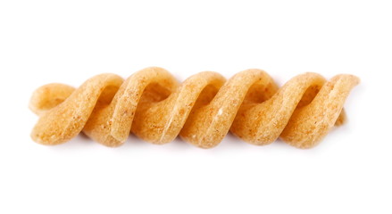 Wholemeal pasta macro isolated on white background, top view