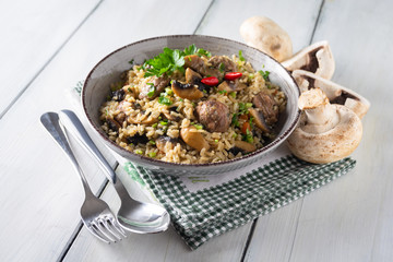 Risotto con salsiccia e funghi