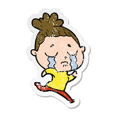 Fototapeta premium distressed sticker of a cartoon crying woman running away
