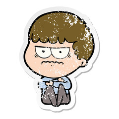 Obraz premium distressed sticker of a cartoon annoyed man