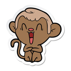 sticker of a cartoon laughing monkey