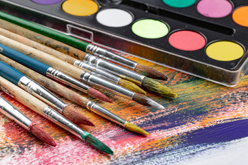 Fototapeta premium Paint brushes and paints for drawing.