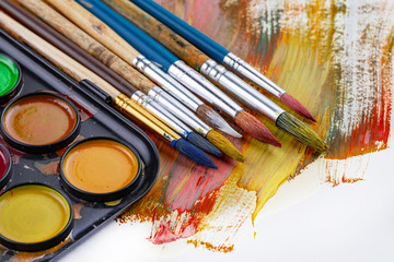 Obraz premium Paint brushes and paints for drawing.