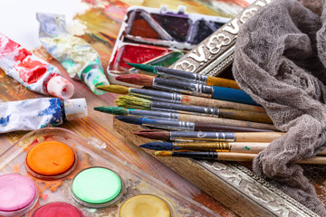 Obraz premium Paint brushes and paints for drawing.