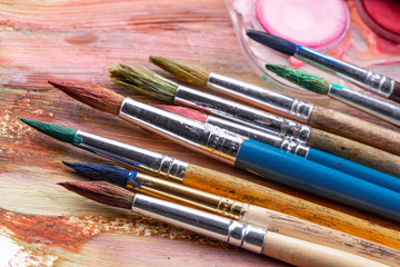 Obraz premium Paint brushes and paints for drawing.