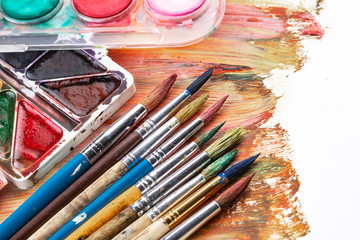 Obraz premium Paint brushes and paints for drawing.