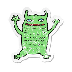 retro distressed sticker of a cartoon little monster