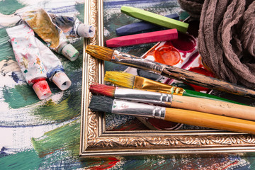 Obraz premium Paint brushes and paints for drawing.