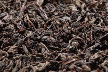 Dried tea leaves. Large leaf black tea.