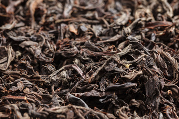 Fototapeta premium Dried tea leaves. Large leaf black tea.