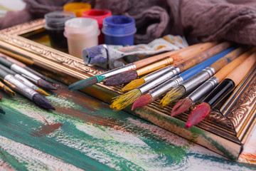 Obraz premium Paint brushes and paints for drawing.