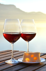Wine and cheese on the terrace of vineyard in Lavaux region, Swi