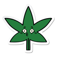 sticker of a cute cartoon marijuana leaf