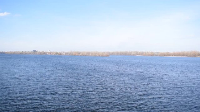 Beautiful view of the wide river in the city. Landscape of spring.
