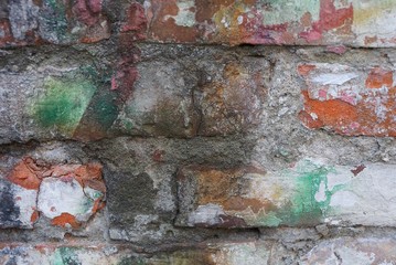 colored stone texture from old dirty bricks in the wall