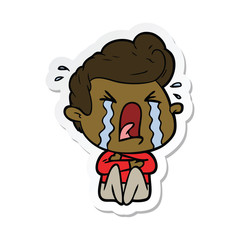 sticker of a cartoon crying man