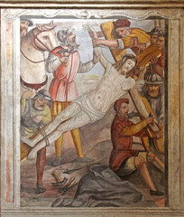 Fototapeta na wymiar Cristo inchiodato sulla croce; affresco nel Coro delle Monache; Brescia, complesso di Santa Giulia