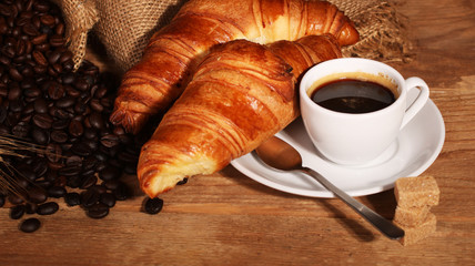 Coffee white cup and croissants