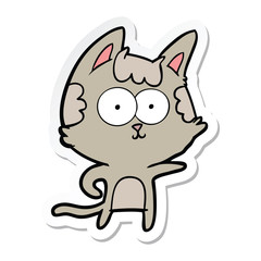 Obraz na płótnie Canvas sticker of a happy cartoon cat pointing