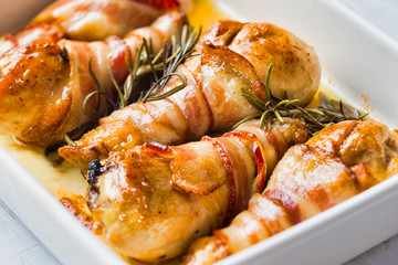 roasted bacon wrapped chicken legs