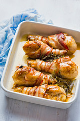 roasted bacon wrapped chicken legs