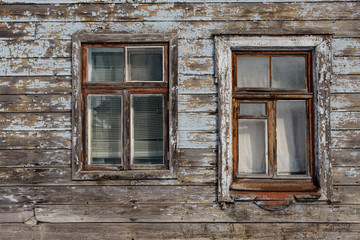Fototapeta na wymiar Old wooden window closeup at a house in Riga, Latvia