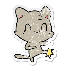 Obraz na płótnie Canvas distressed sticker of a cartoon happy cat karate kicking