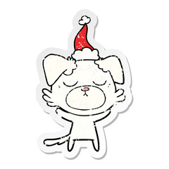 cute distressed sticker cartoon of a dog wearing santa hat