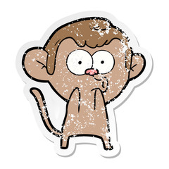 distressed sticker of a cartoon surprised monkey